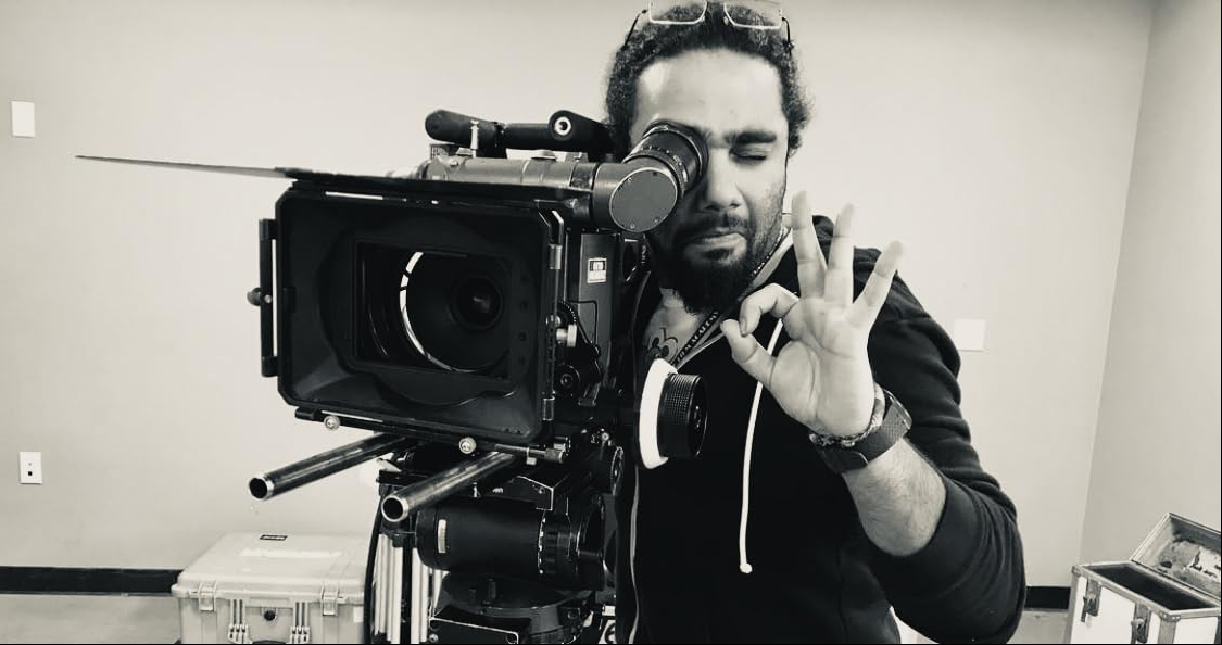Ali Esbai behind the camera on set